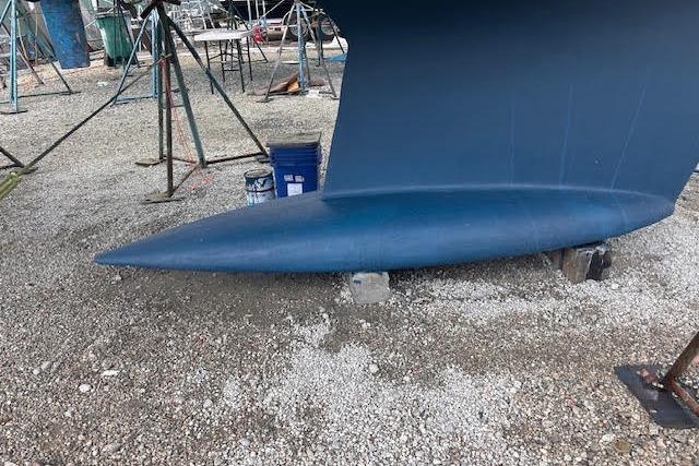 Keel of 2007 Jeanneau Sun Odyssey 42 DS sailboat on dry dock.