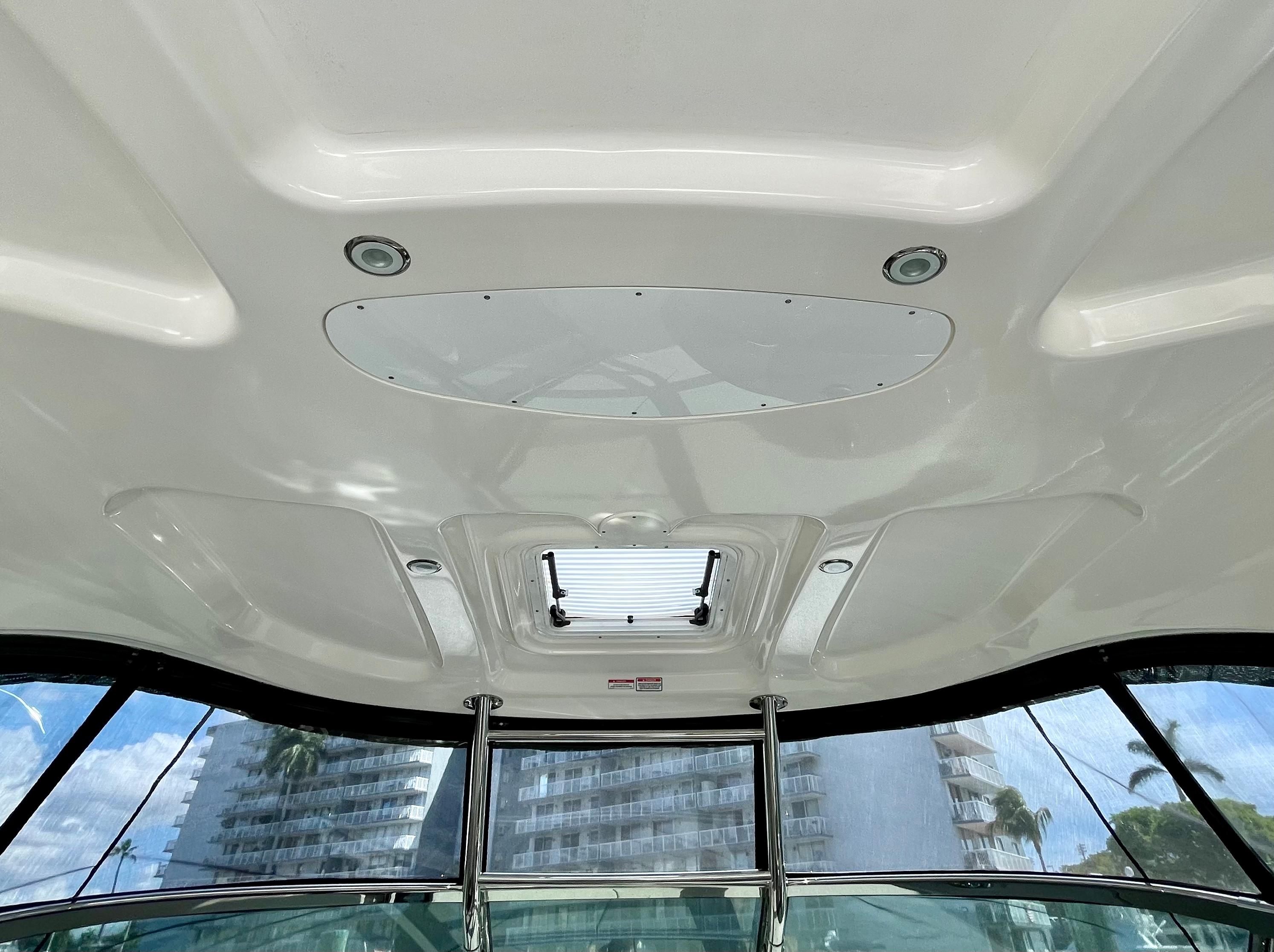 Interior ceiling view of 2008 Sea Ray 40 Sundancer yacht with skylight and windows.