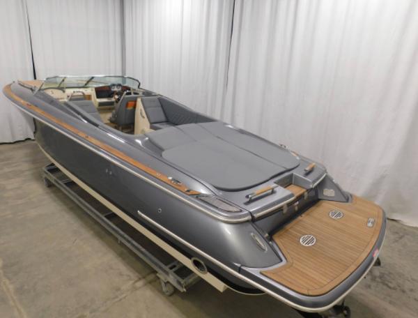 2021 Chris-Craft Corsair 34 boat in a showroom.