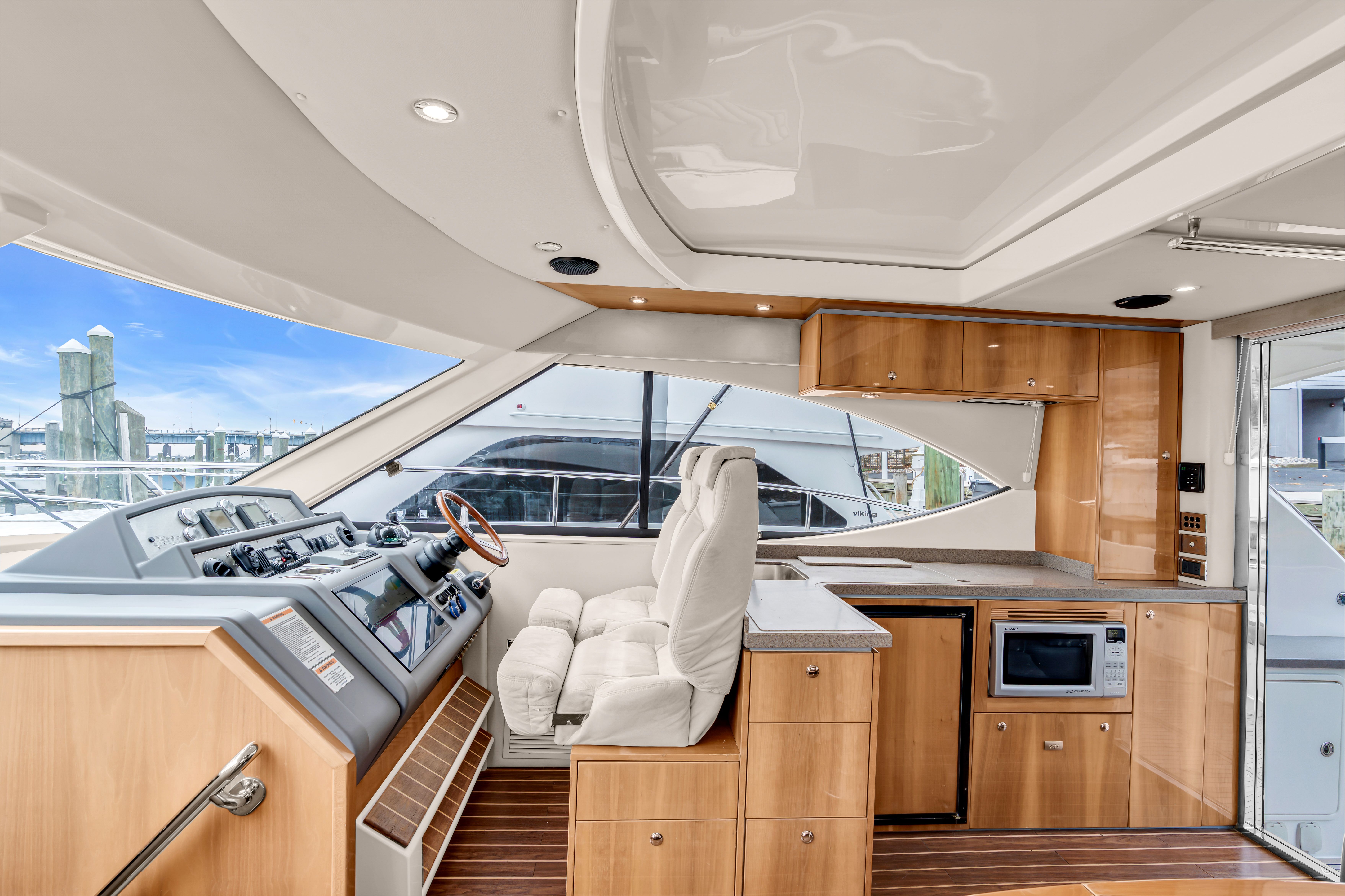 Interior of a 2014 Riviera 44 Sport Yacht with modern amenities.