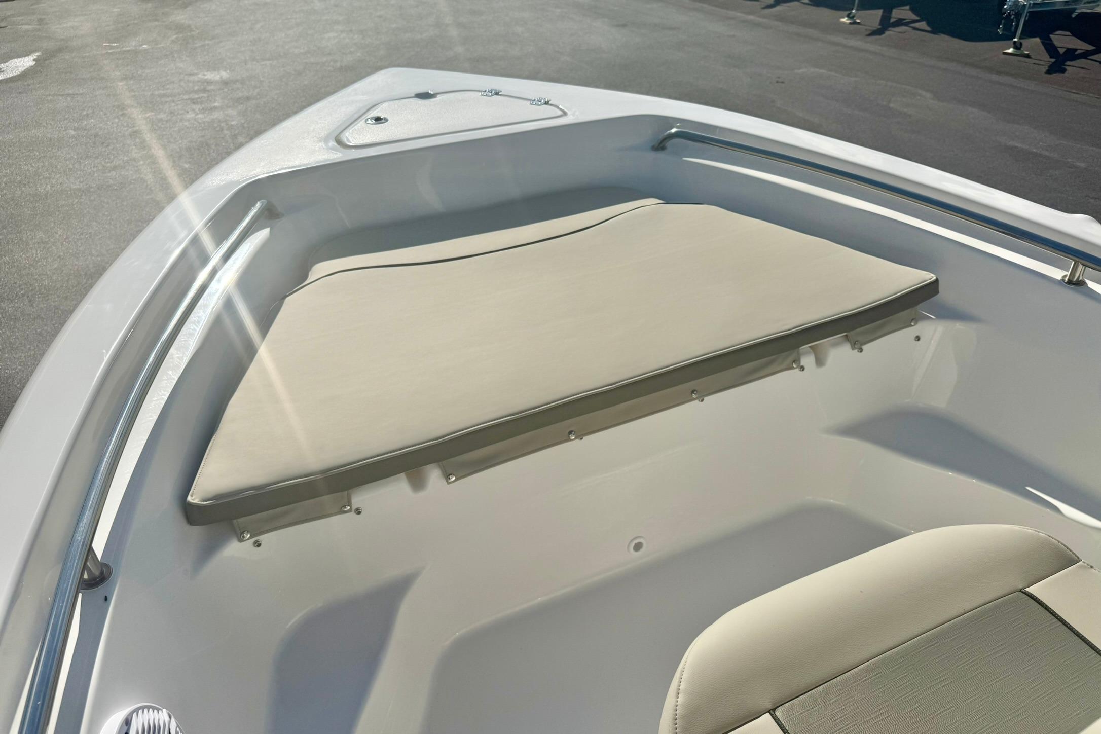2026 Key West 189 FS boat interior with cushioned seating and sleek design.