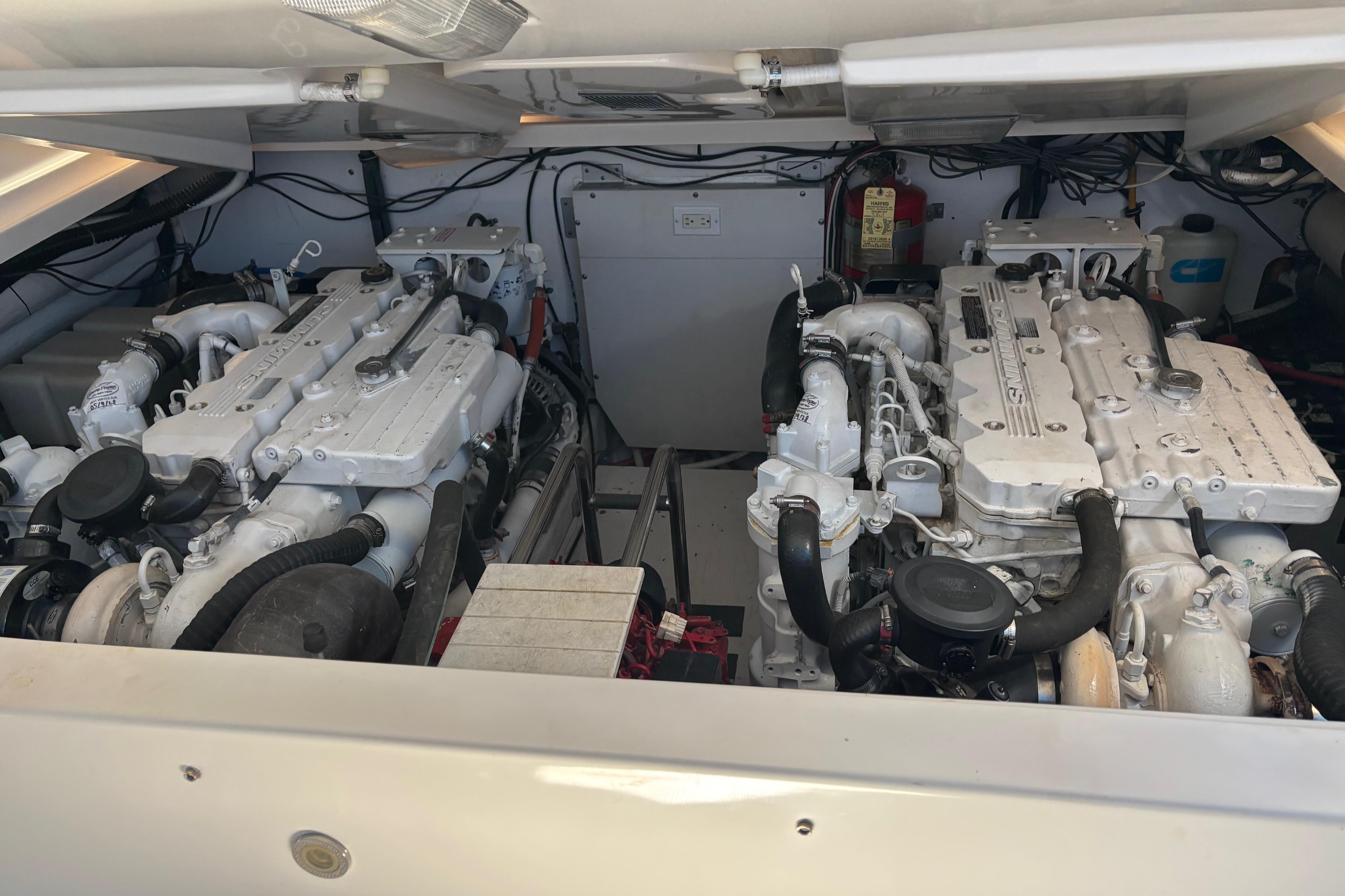 Engine room of a 2005 Tiara Yachts 3600 Open, showcasing dual engines.