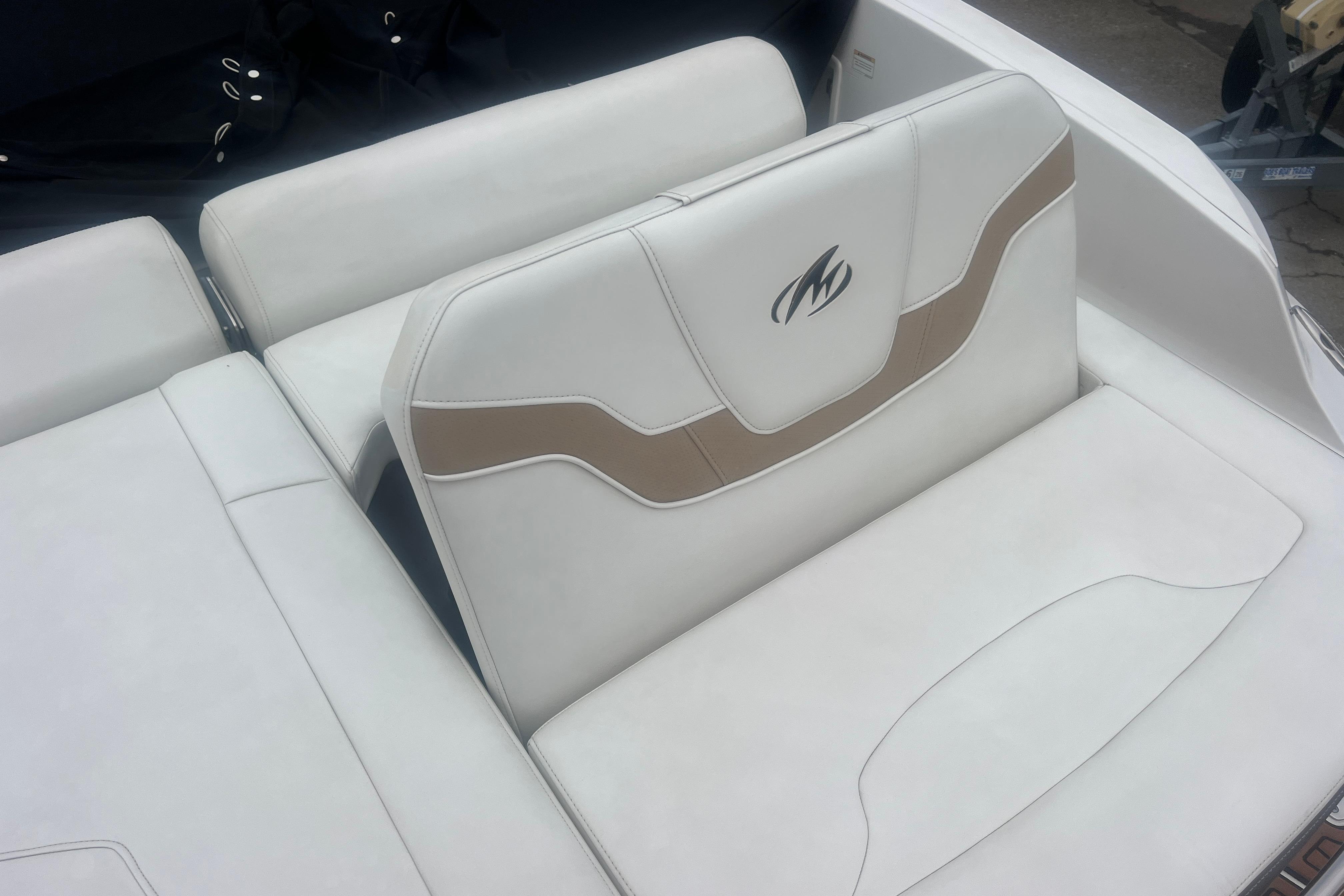 2017 Monterey 298SS Super Sport boat interior with white and beige seating.
