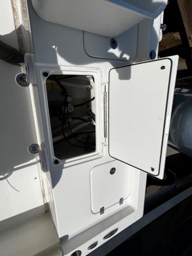 Open storage compartment on a 2024 Key West 188 Bay Reef boat.