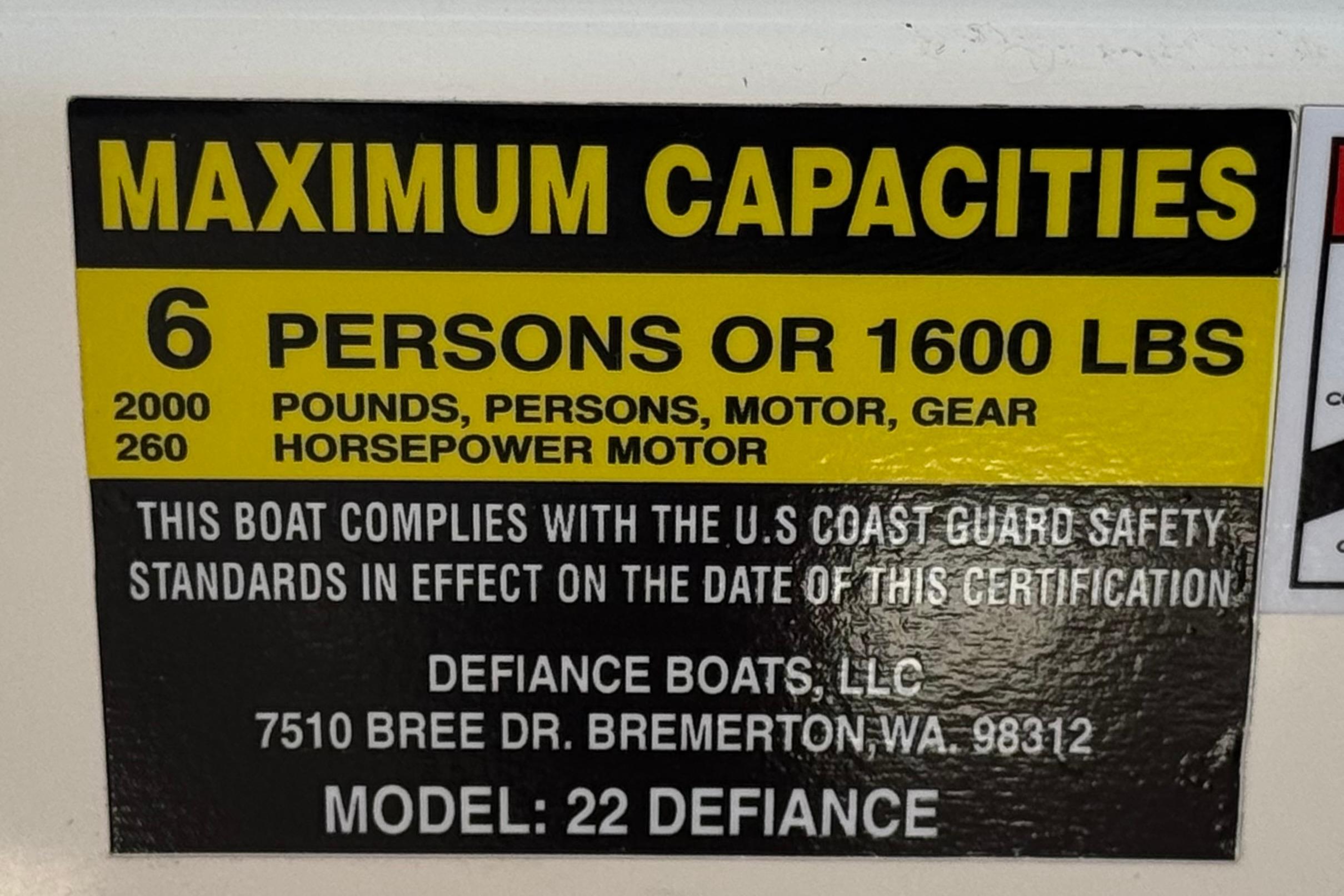 2017 Defiance Admiral 220 EX capacity label: 6 persons, 1600 lbs, 2000 lbs total.