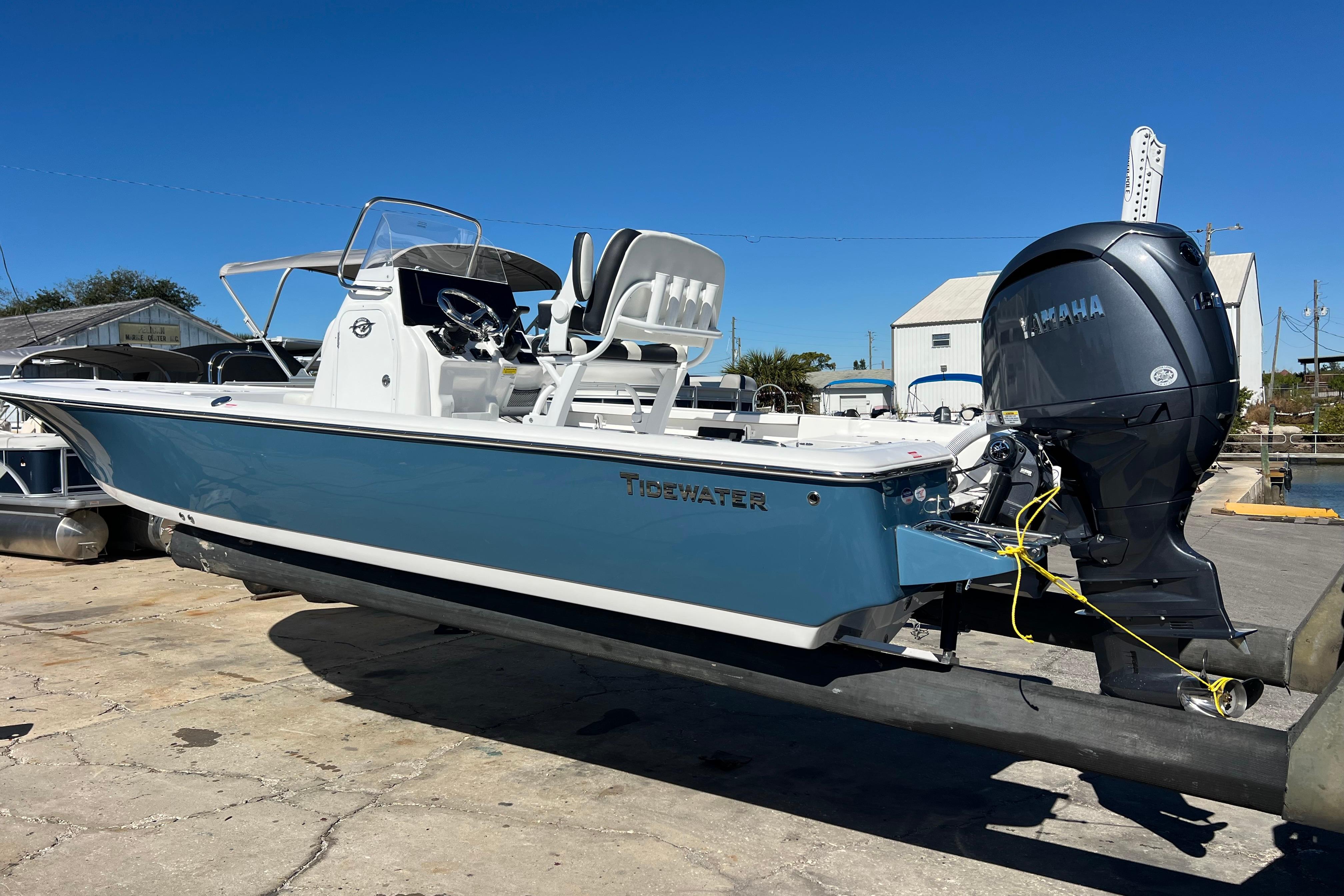 2026 Tidewater 2110 Bay Max boat with Yamaha engine on a trailer.