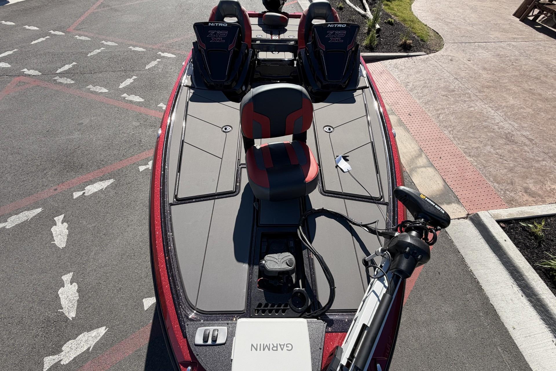 2026 Nitro Z19 XL Pro boat with Garmin equipment, parked on a paved surface.