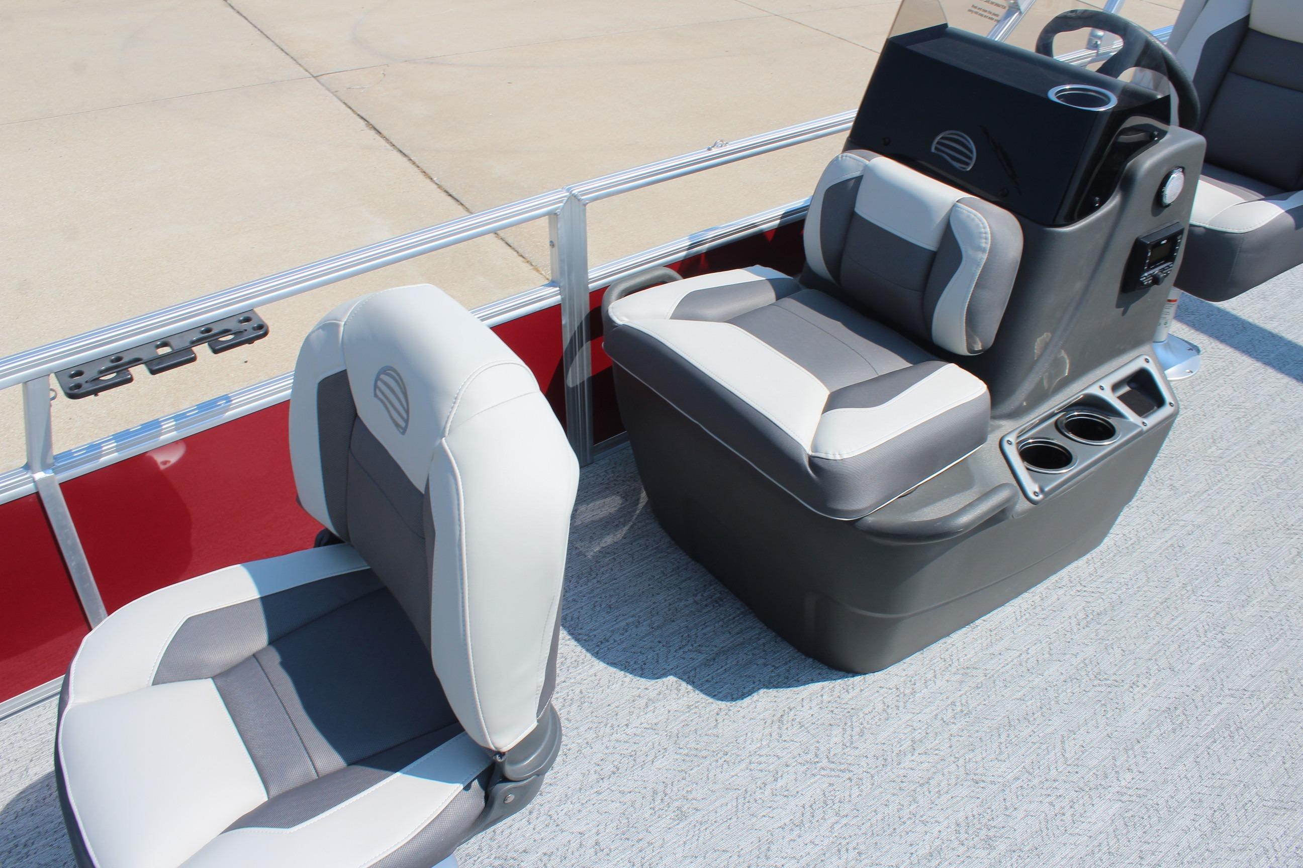 2026 Sun Tracker Bass Buggy 18 DLX boat interior with gray and white seating.