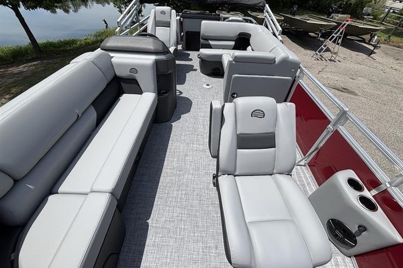 2026 Sun Tracker SportFish 20 DLX pontoon boat with spacious seating and modern design.