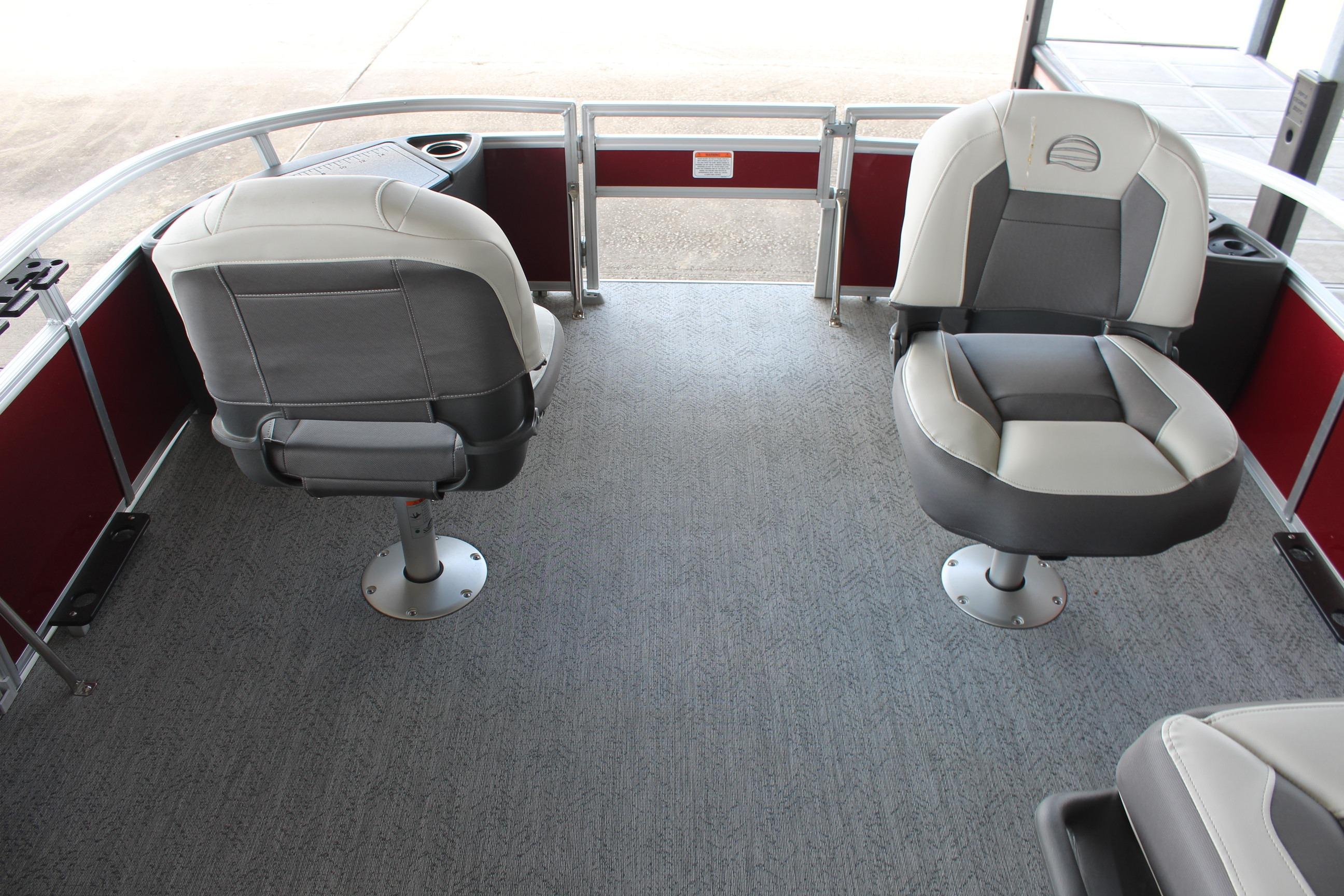 Interior of 2026 Sun Tracker Bass Buggy 18 DLX pontoon boat with swivel seats.