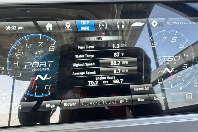 Dashboard of a 2021 Yamaha Boats 275SD showing trip info and engine metrics.