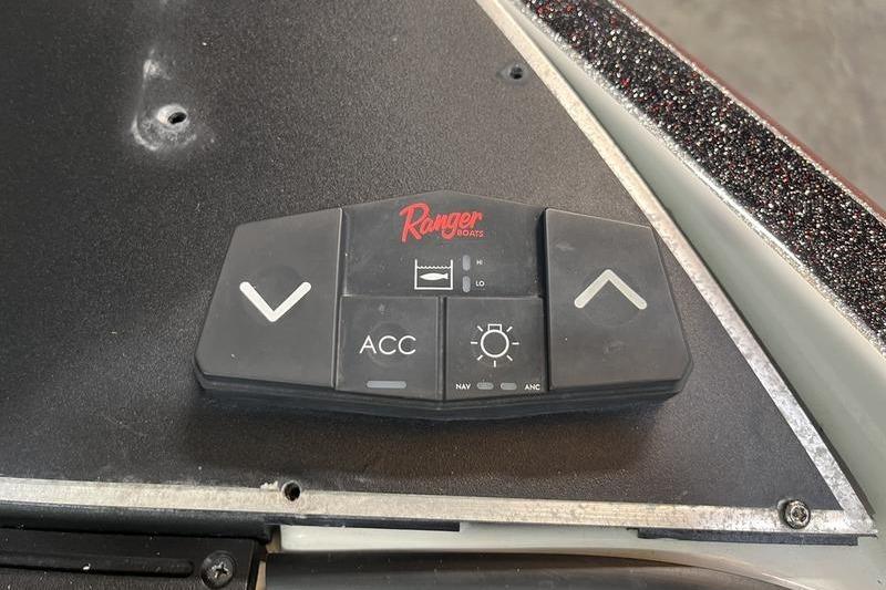 Control panel of 2022 Ranger Z520R boat with navigation and accessory buttons.