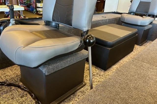 2025 Tracker Panfish 17 boat interior with cushioned seats and carpeted flooring.