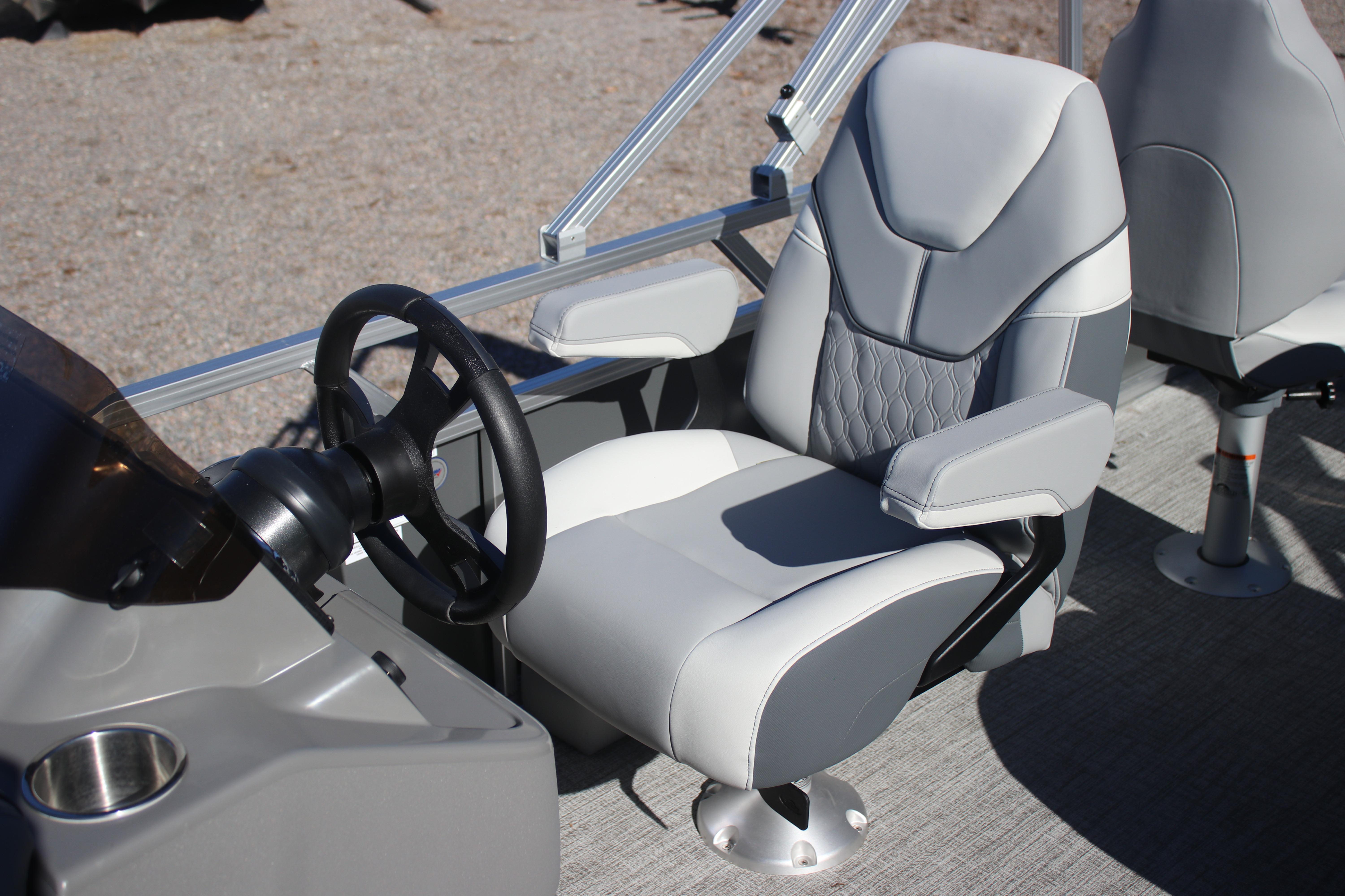 2026 Avalon VENTURE 85 QUAD boat interior with modern steering and comfortable seating.