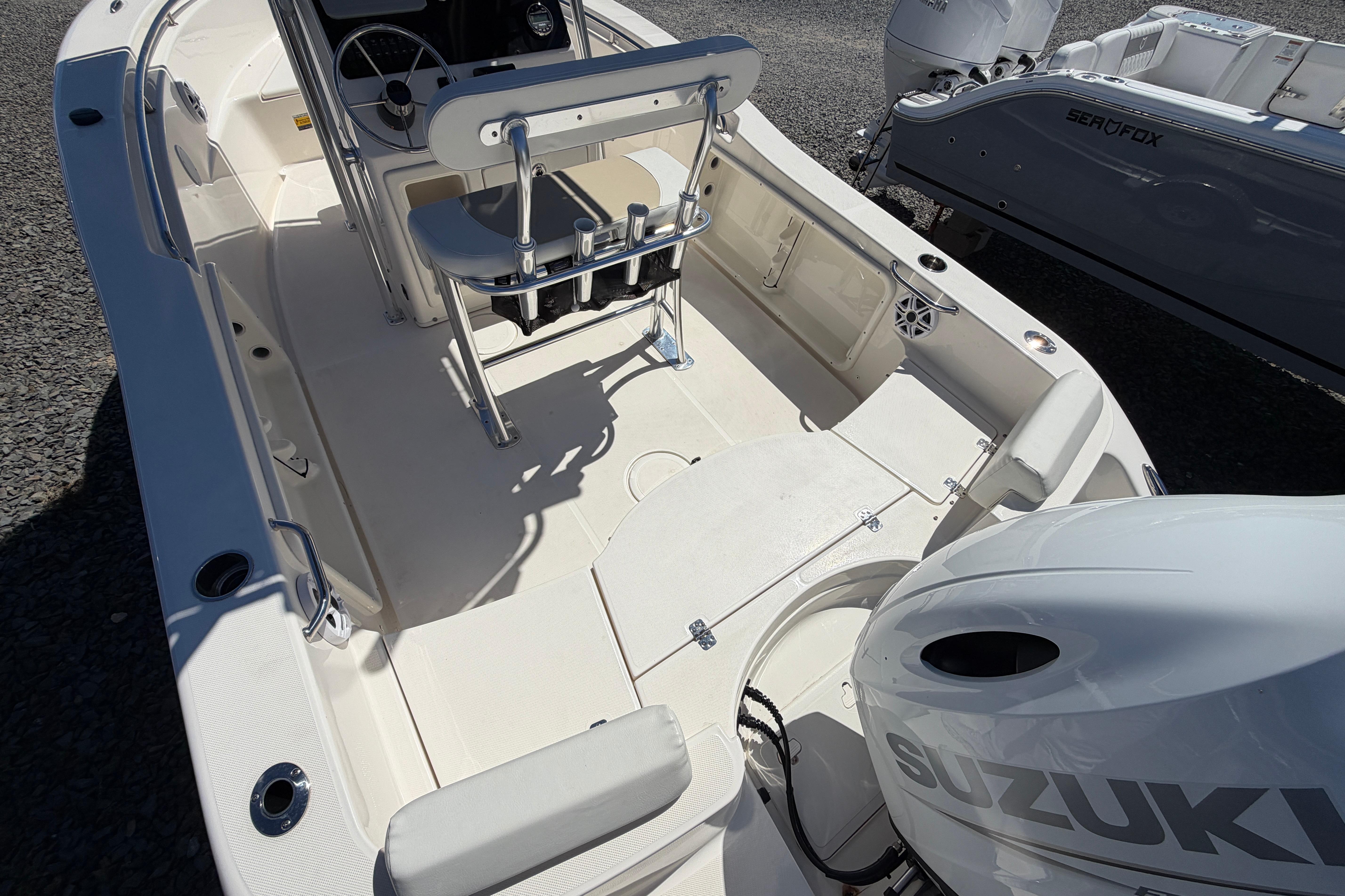 2023 Bulls Bay 200 Center Console boat with Suzuki engine, spacious deck, and seating.