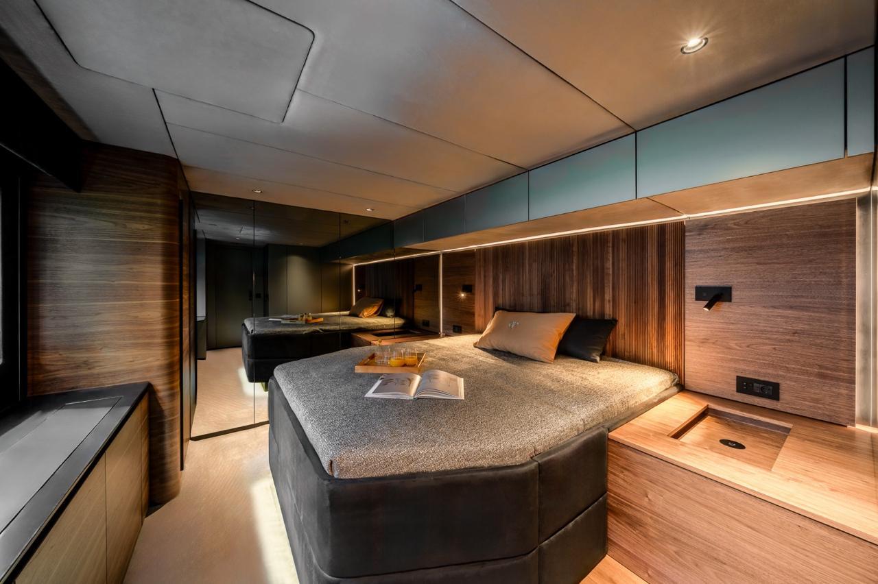 Luxurious interior of 2024 Sunreef 60 Eco yacht with modern bedroom design.