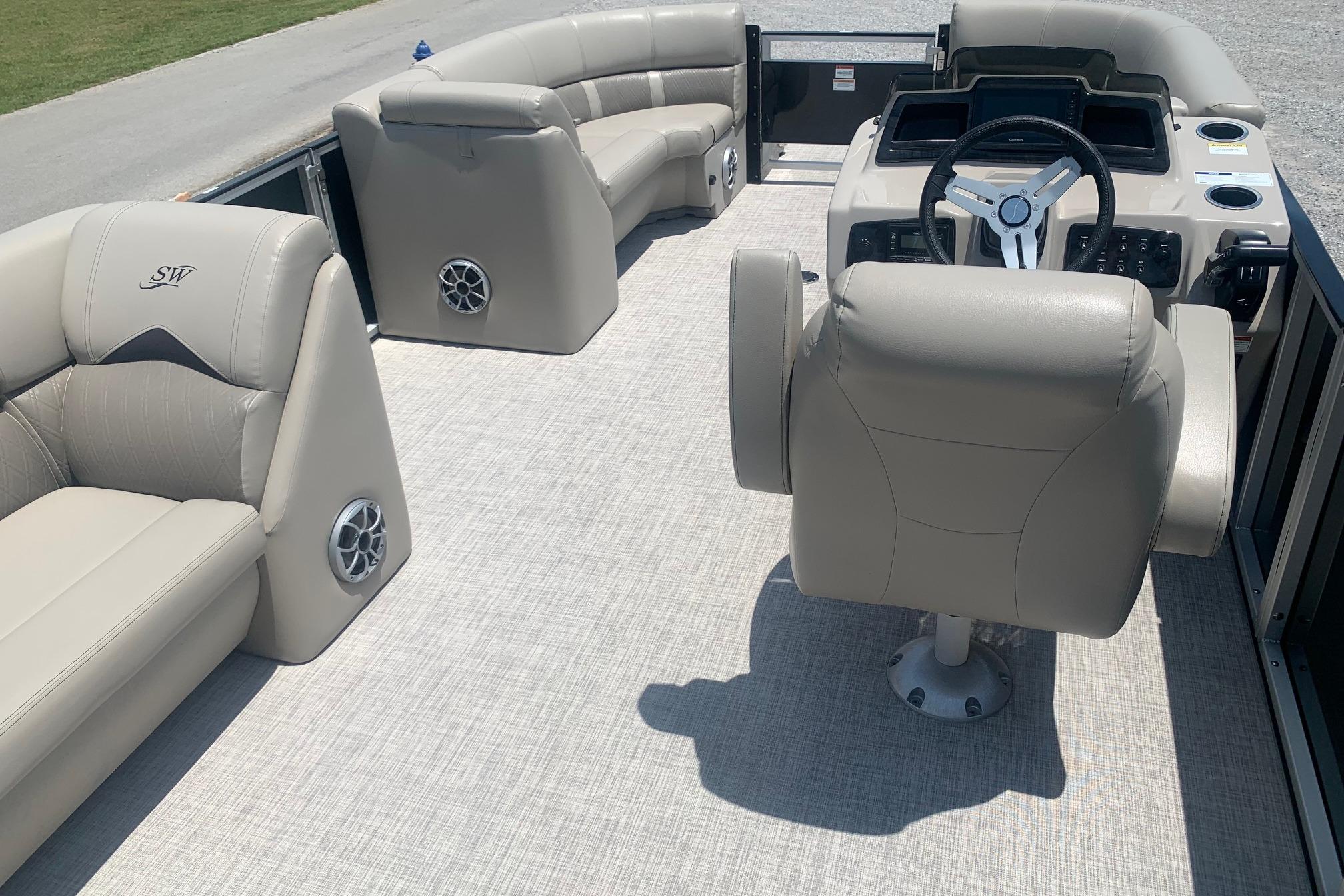 Luxurious interior of 2023 Silver Wave 2410 SW3 CLS pontoon boat with plush seating.