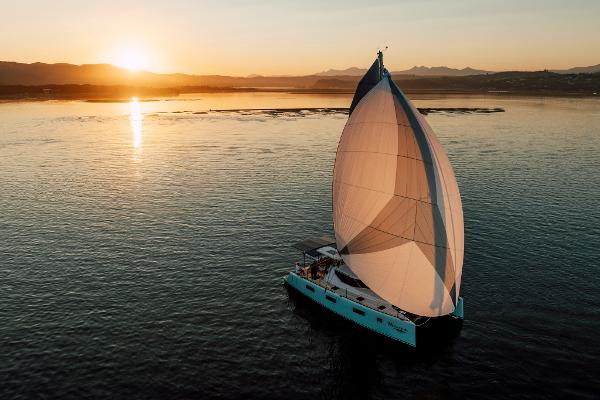 Sailing yacht Vision 444 at sunset on calm waters, 2025 model.