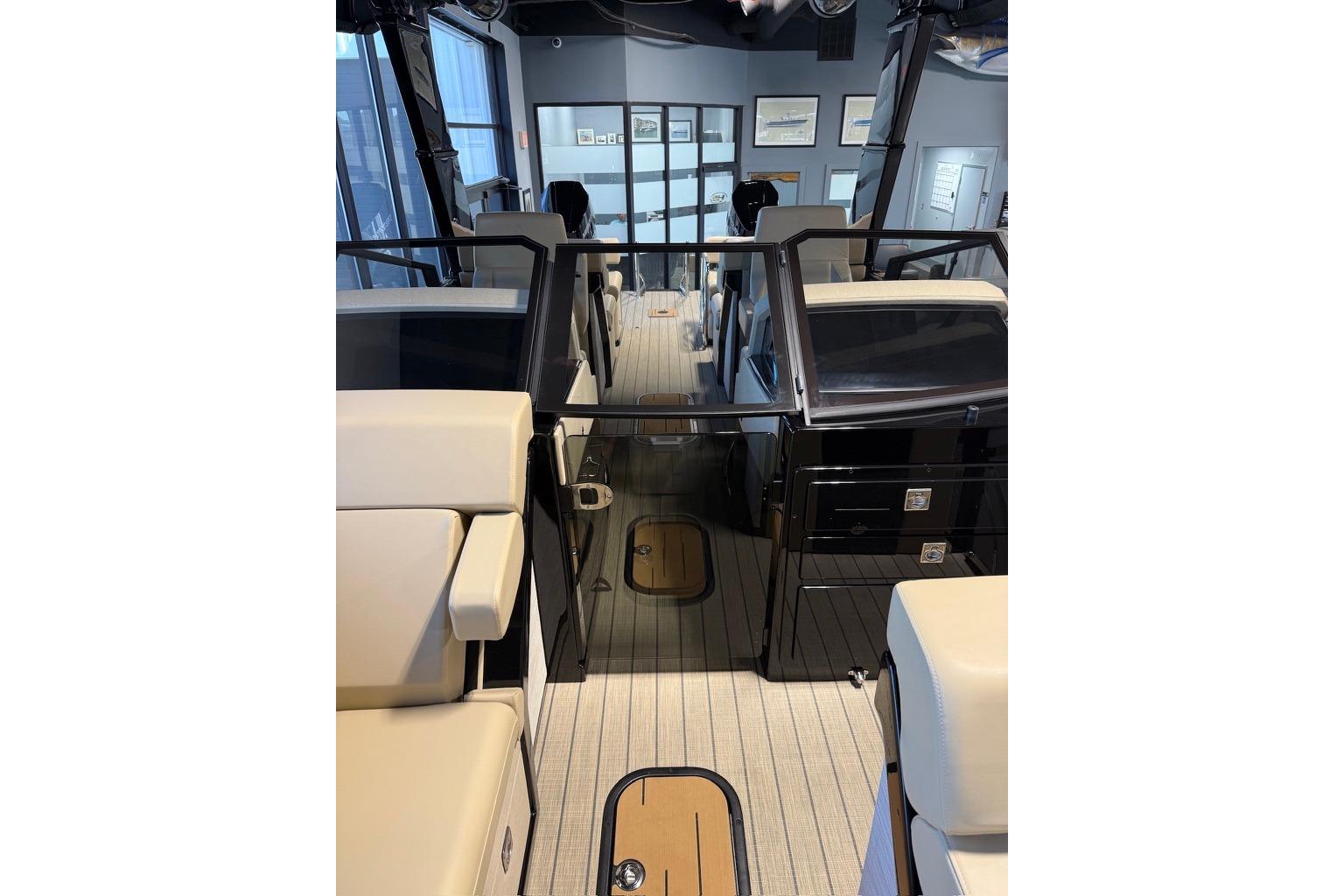 Interior view of 2026 Balise Halo 26C Twin boat, featuring sleek seating and modern design.