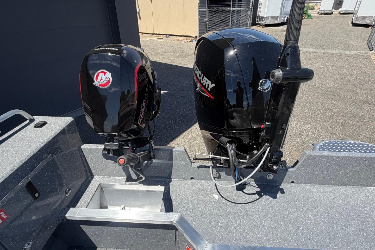 2026 Thunder Jet 209 Rush OT boat with dual Mercury outboard motors.