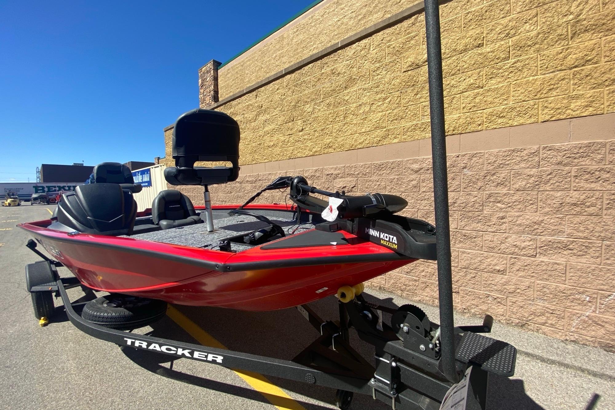 2026 Tracker Pro Team 175 boat on trailer, parked outdoors.