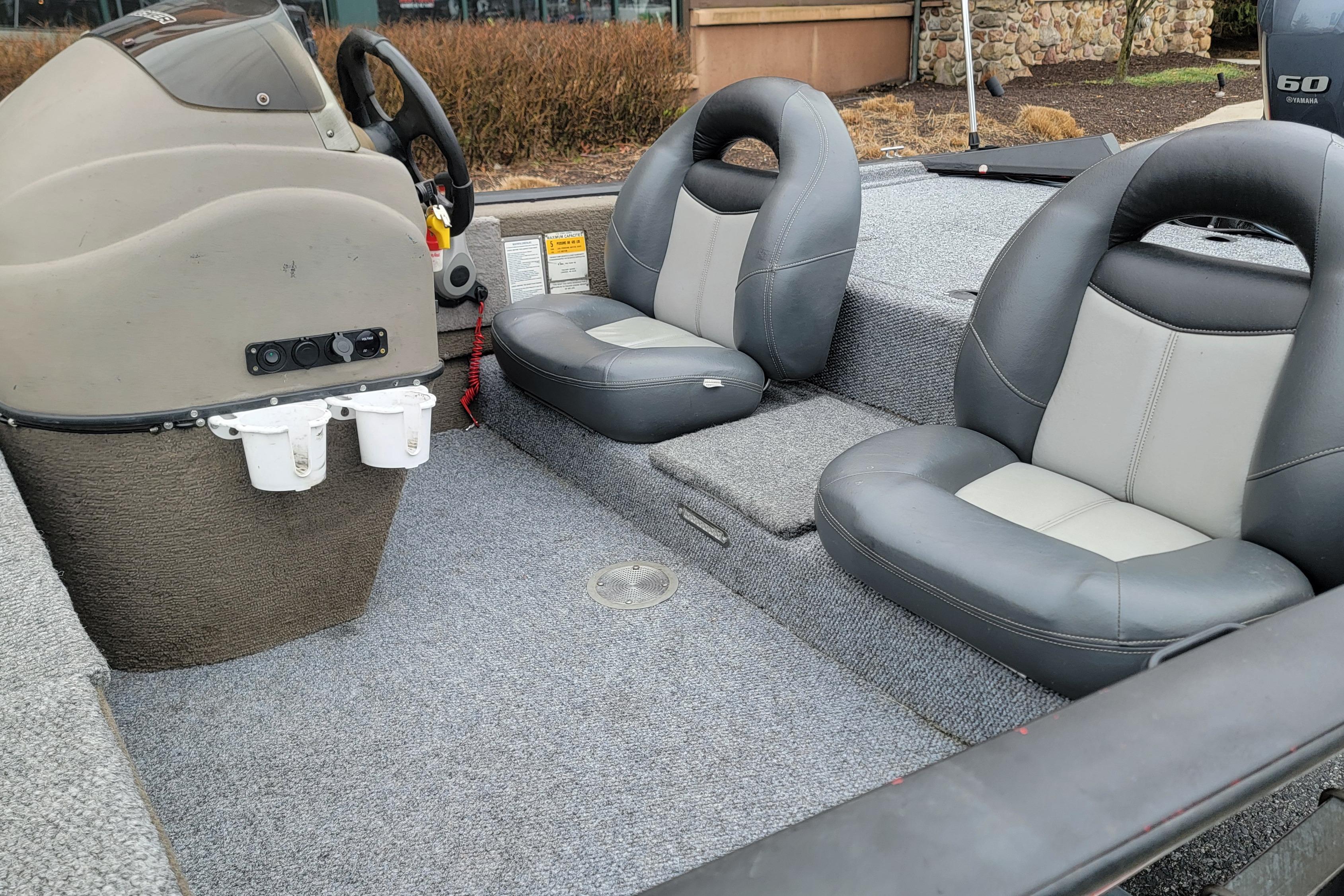 2006 Tracker Pro Team 190 TX boat interior with gray seating and steering console.