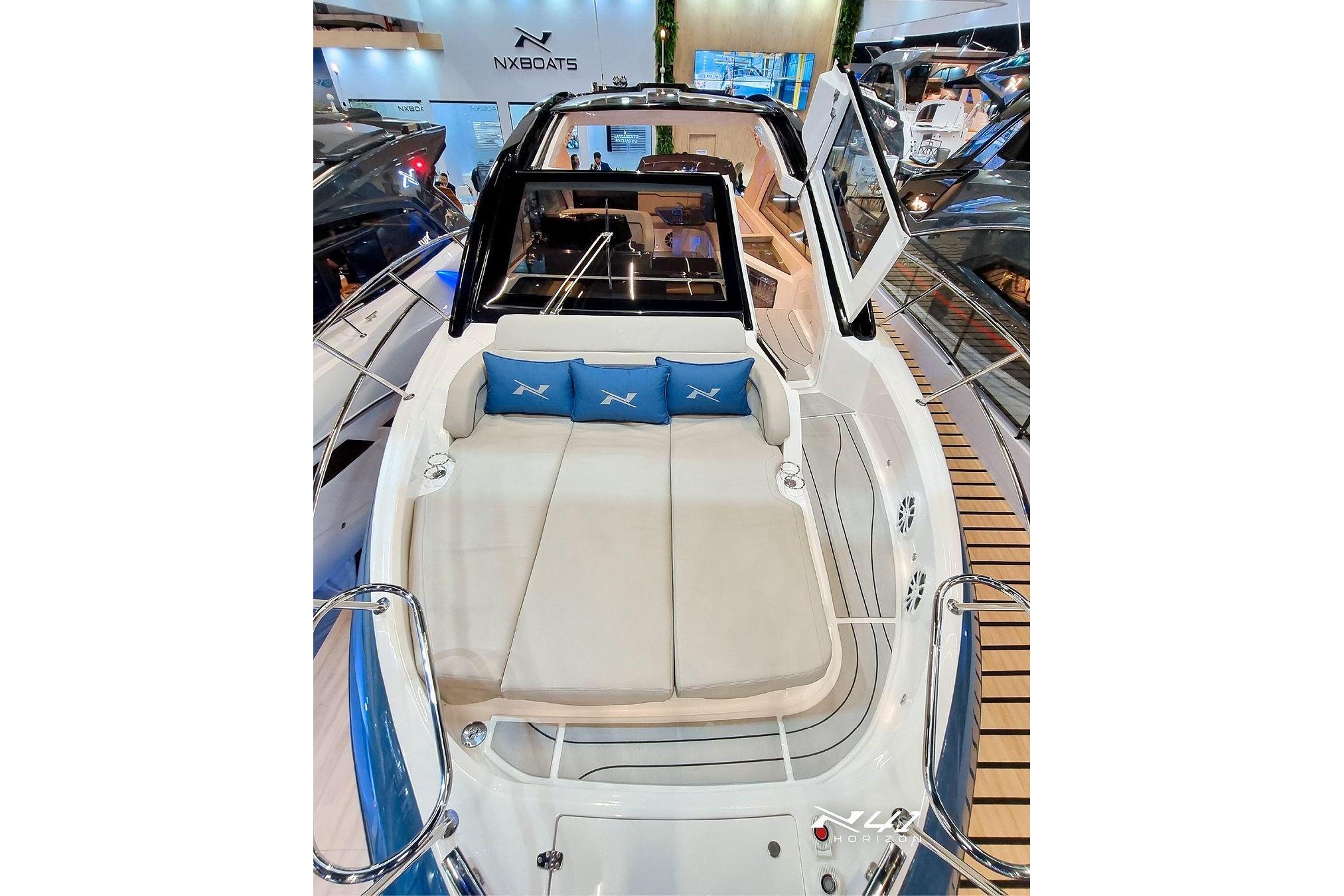 2025 NX Boats NX41 HORIZON luxury yacht interior with plush seating and modern design.