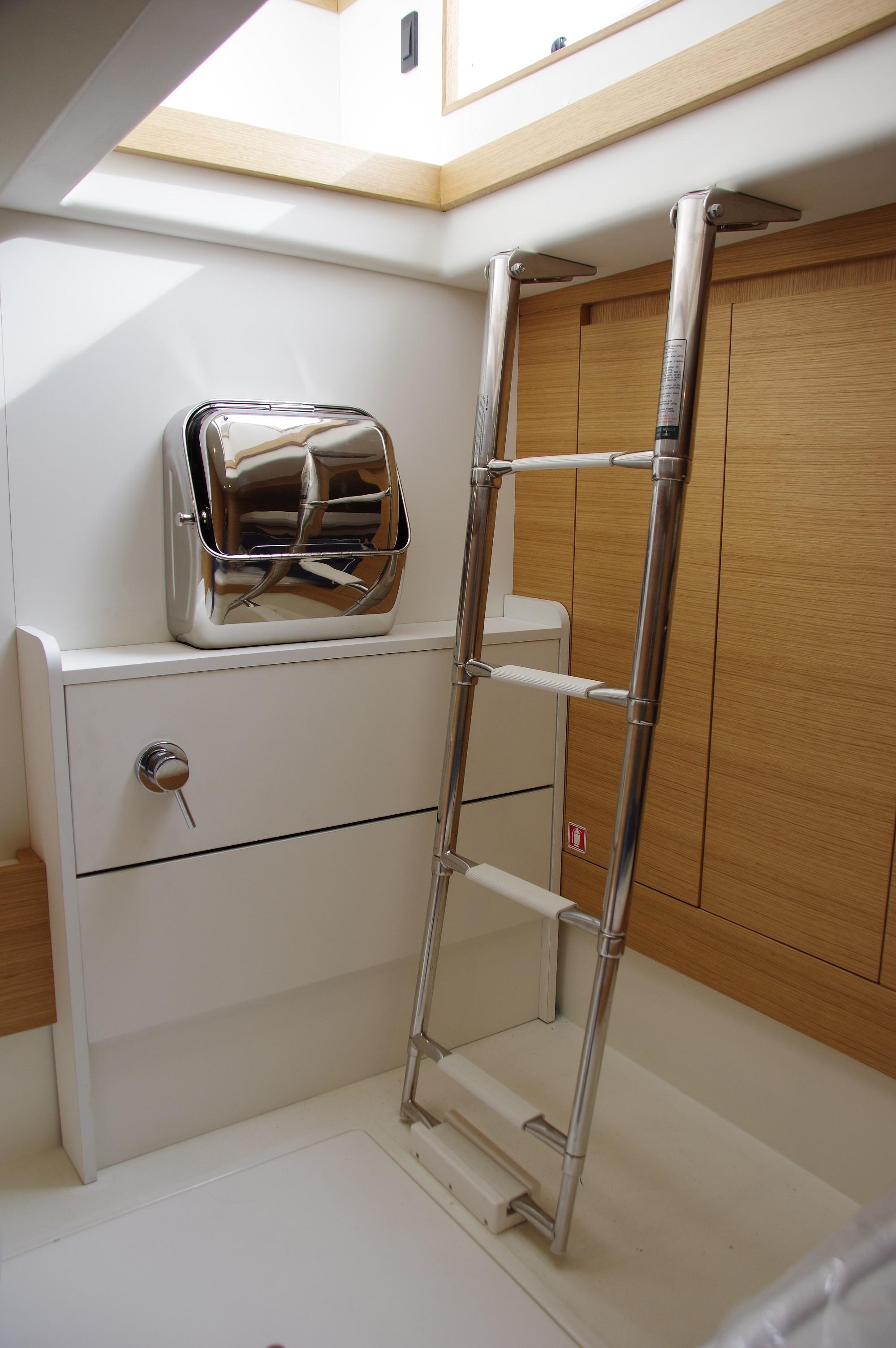Interior of 2025 Pardo Yachts 50, featuring sleek ladder and modern design elements.