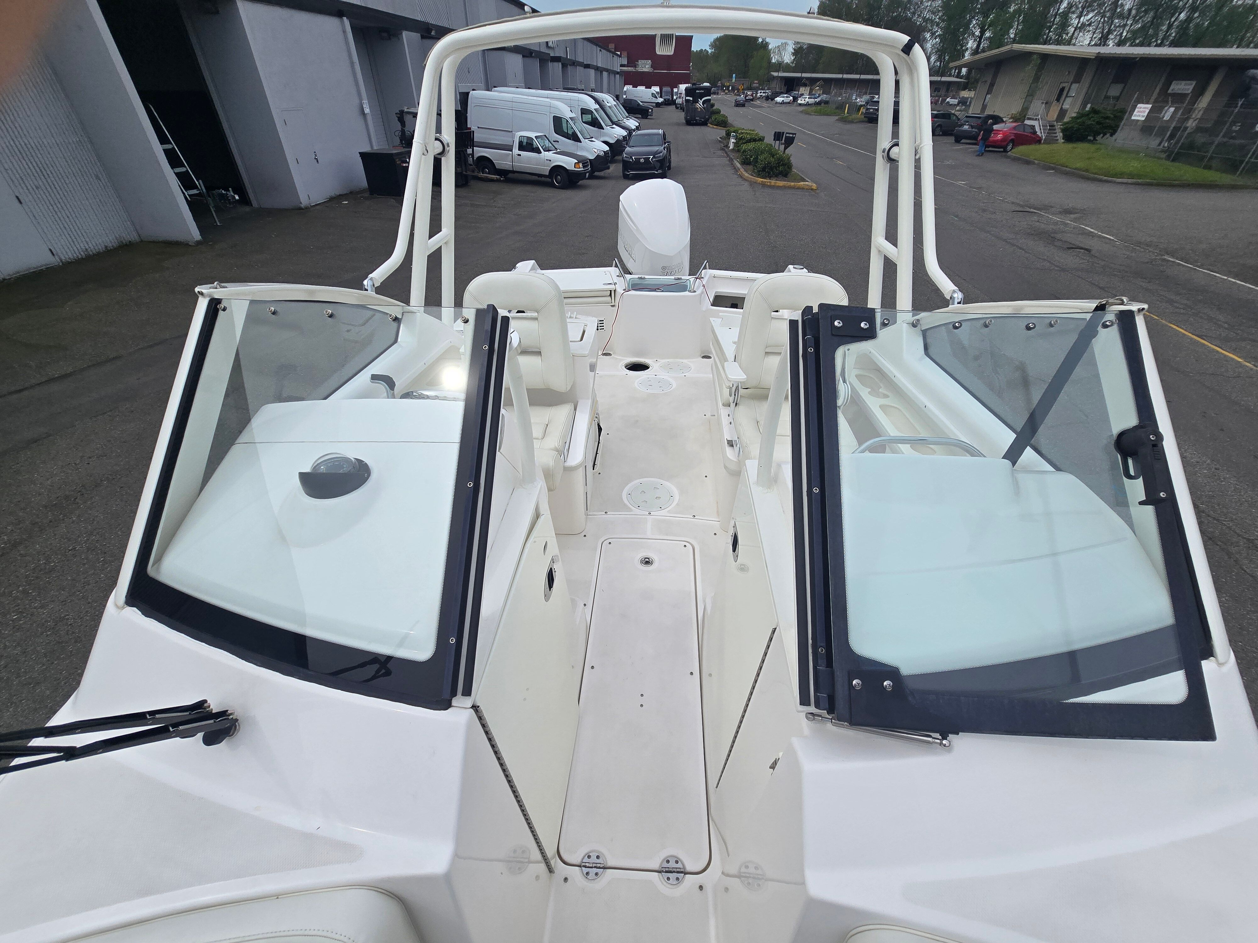 2017 Everglades 230 Dual Console on a parking lot.