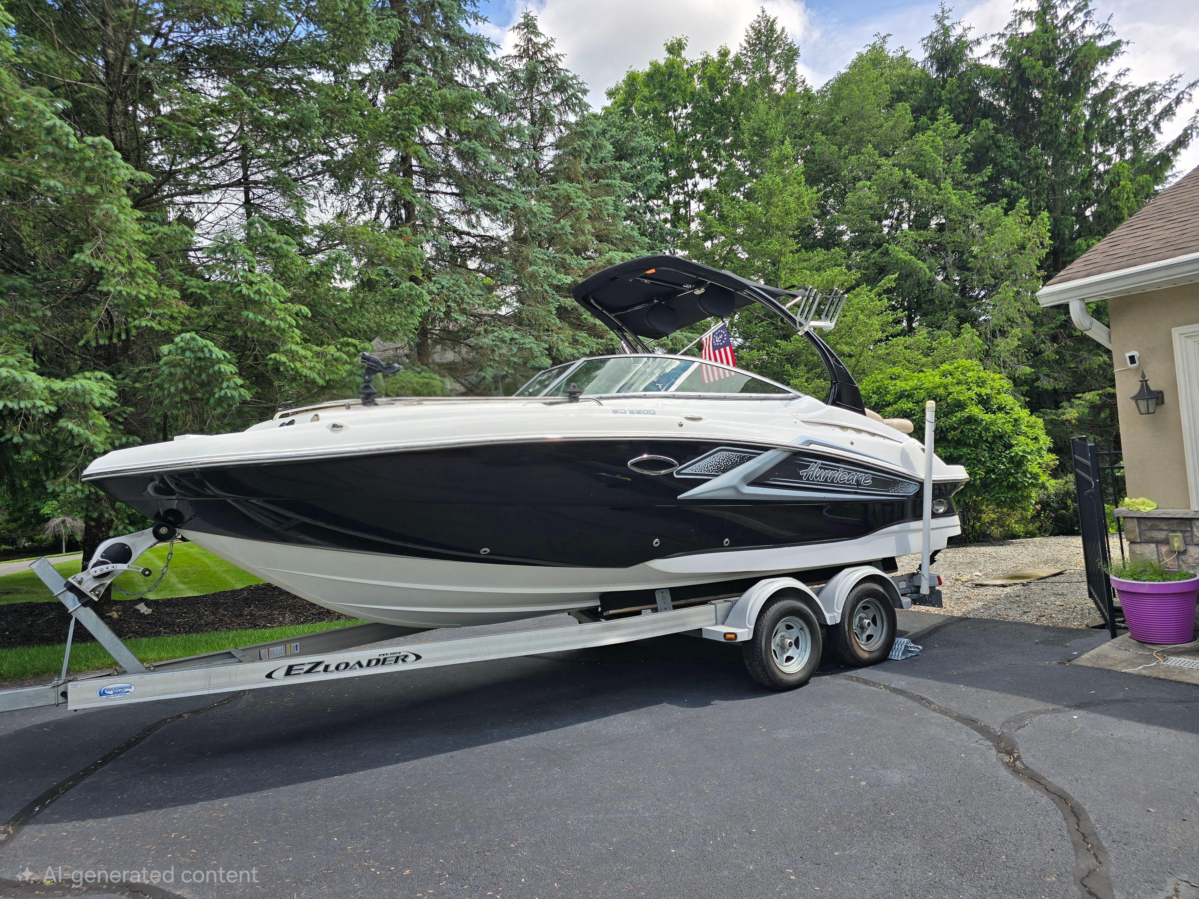 2016 Hurricane SD 2200 boat parked on trailer outdoors.