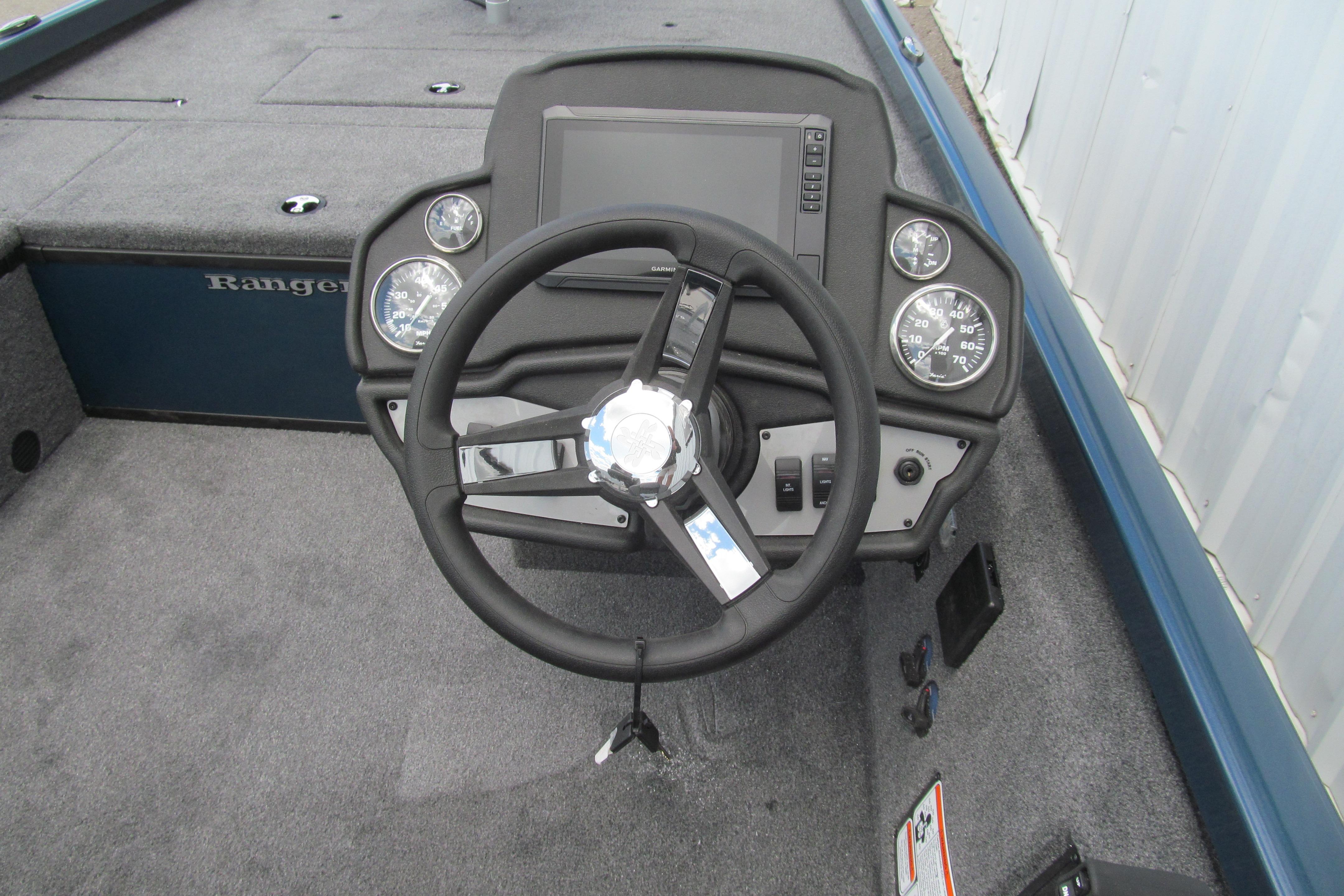 2026 Ranger RT188C boat dashboard with steering wheel and gauges.