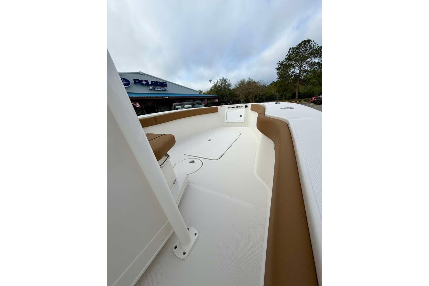 2026 Ranger 2600 Bay boat interior with tan seating and white deck.