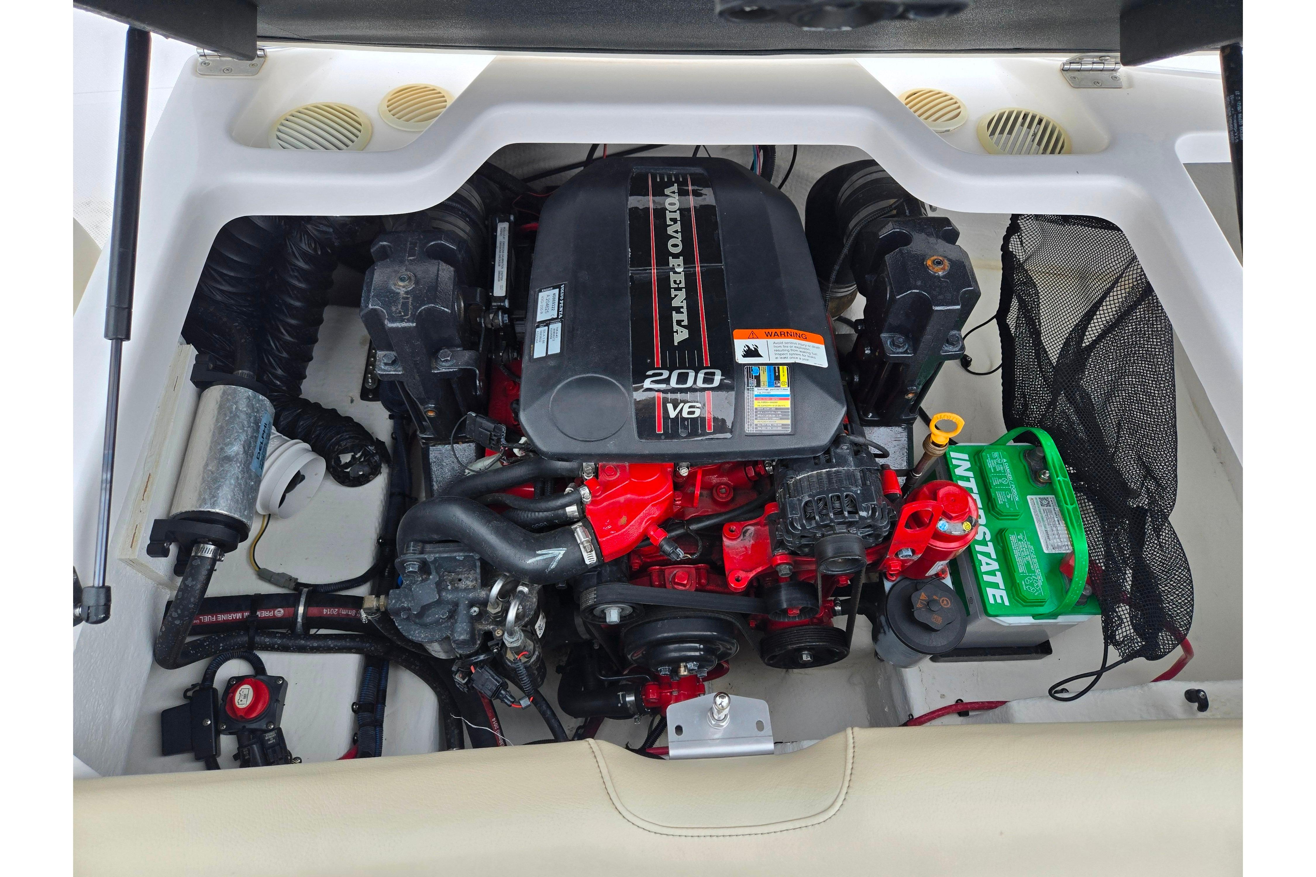 Engine compartment of a 2015 Regal 1900 ES Bowrider with Volvo Penta V6 engine.