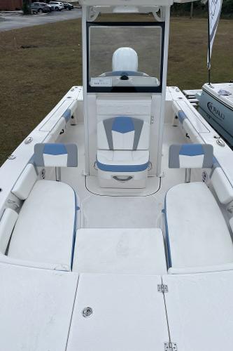 2026 Robalo 246 Cayman boat interior with seating and console, showcasing modern design.