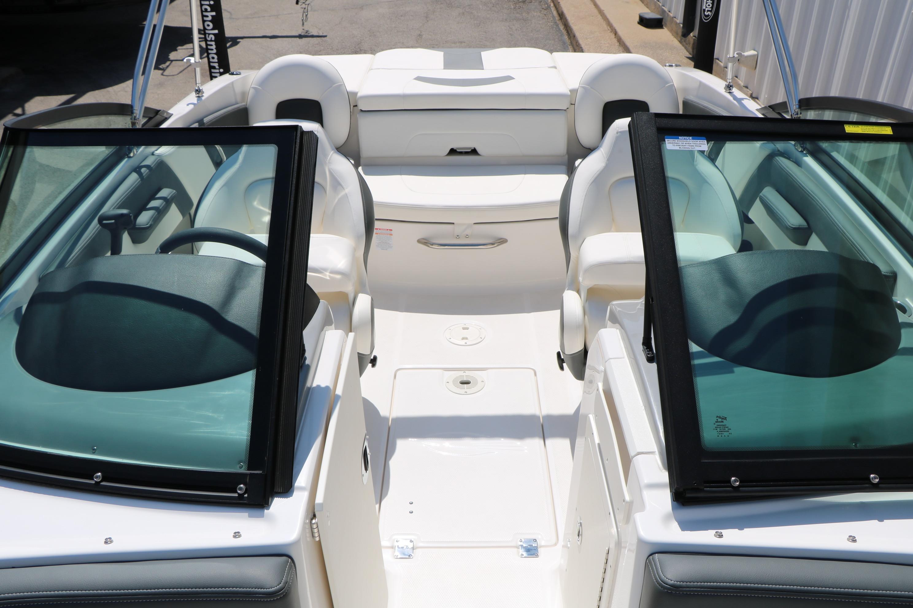2025 Chaparral 21 SSi Ski & Fish boat interior with dual consoles and seating.