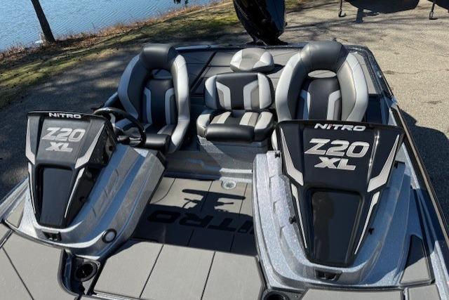 2026 Nitro Z20 XL Pro boat with dual seats and sleek design by the water.