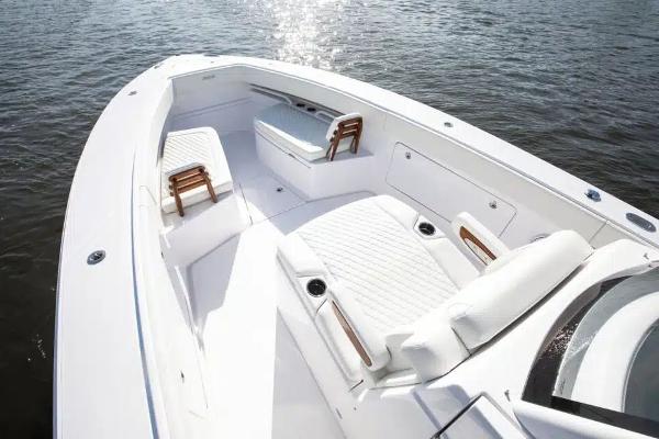 Manufacturer Provided Image: 2026 Jupiter 340LS boat with spacious white deck and seating on water.