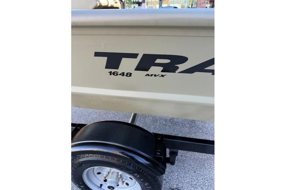 2026 Tracker Grizzly 1648 SC boat trailer with visible wheel and model branding.