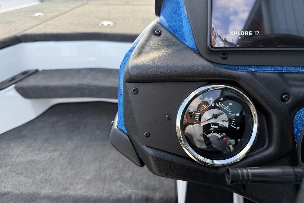 2026 Skeeter ZXR19 SE boat dashboard with RPM gauge and Xplore 12 display.