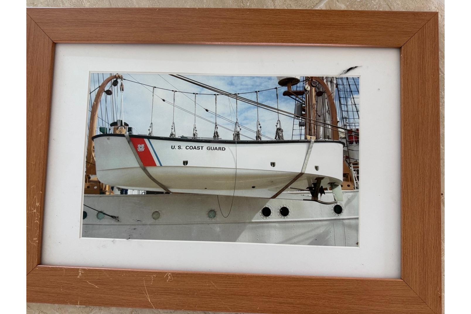 Framed photo of a U.S. Coast Guard boat by Ocean Technical Services, 1997.