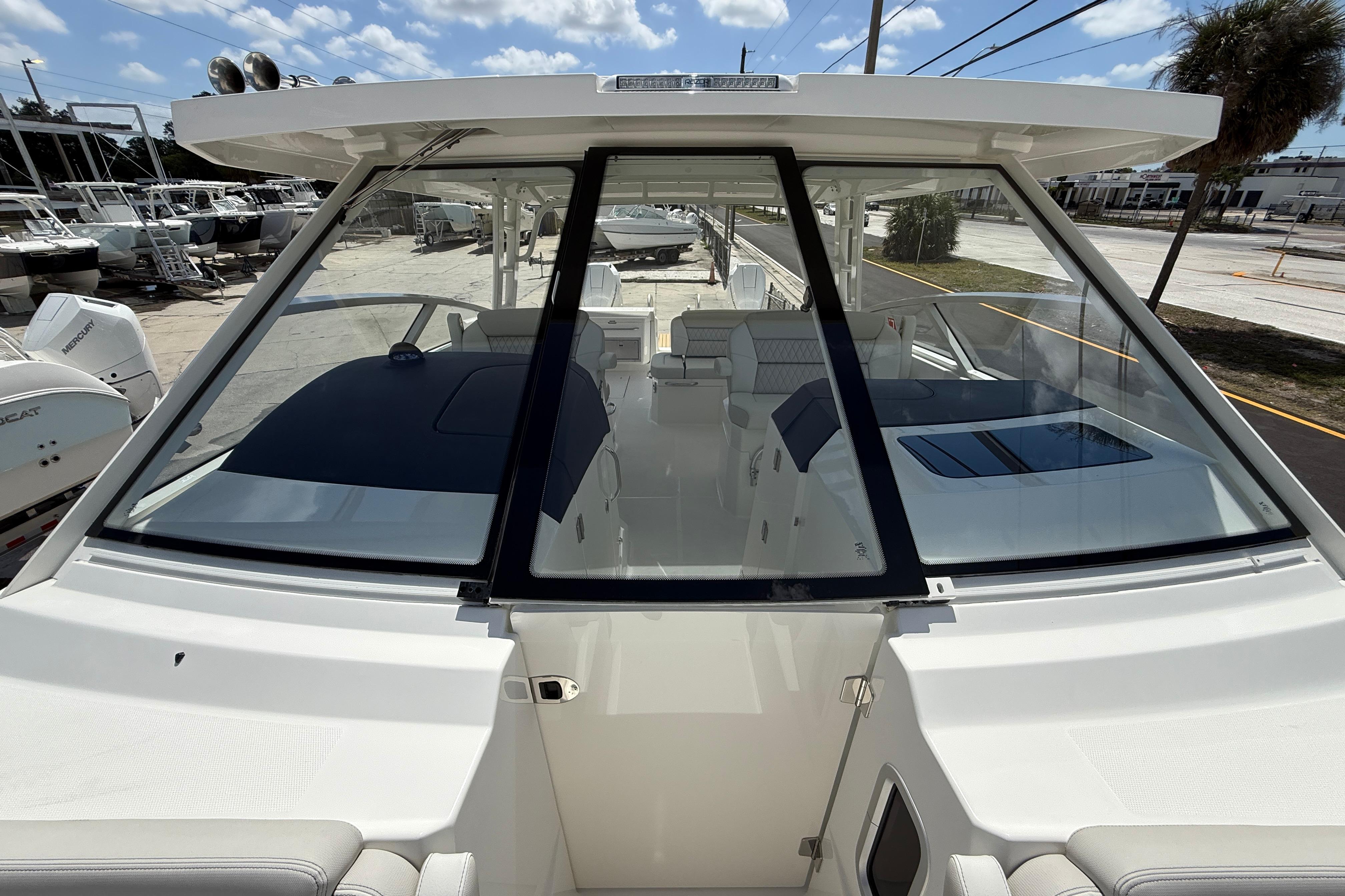 2026 World Cat 400 DC-X Island boat with spacious cockpit and modern design.