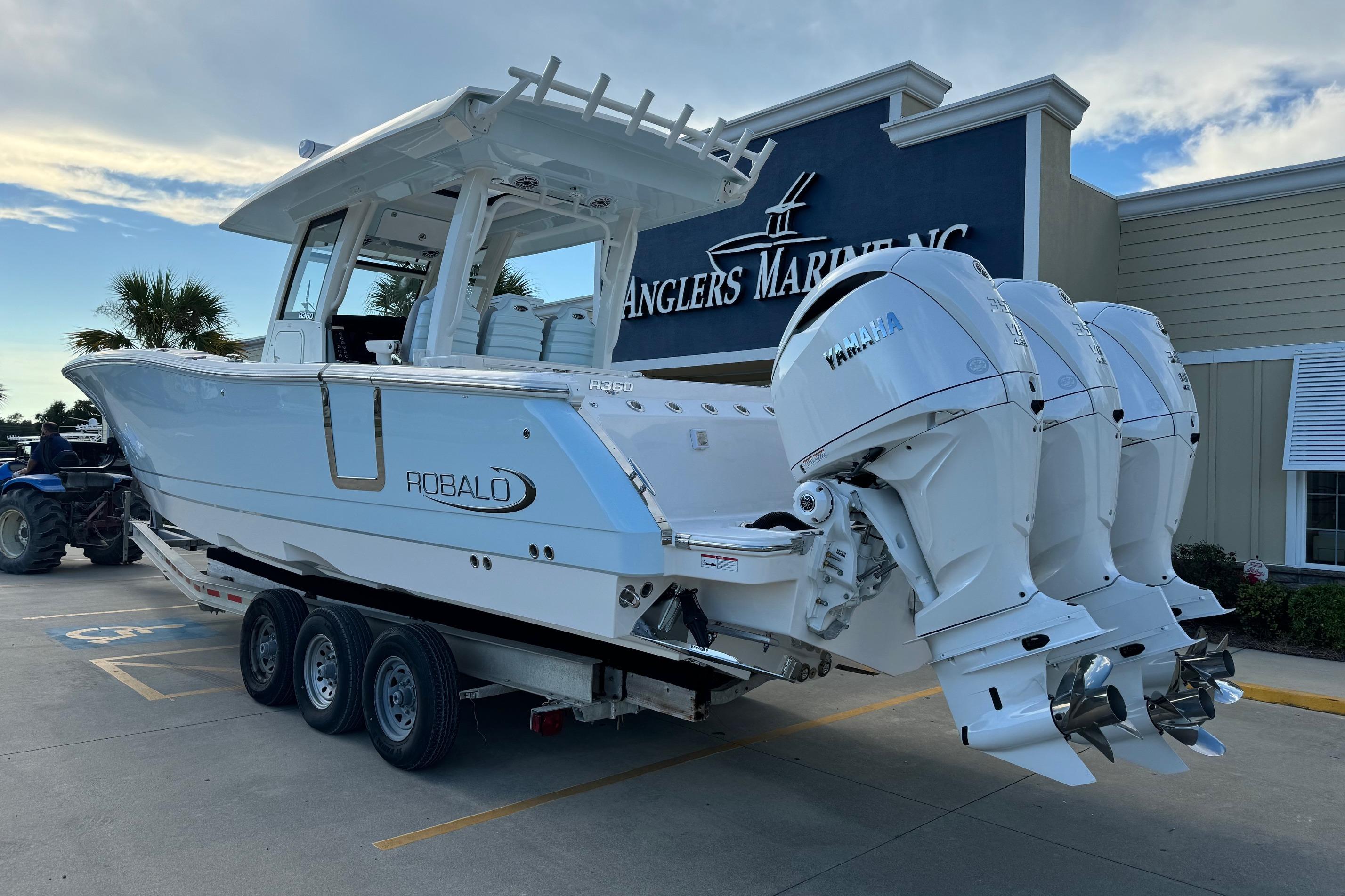 2025 Robalo R360 Center Console boat with triple Yamaha engines at Anglers Marine.