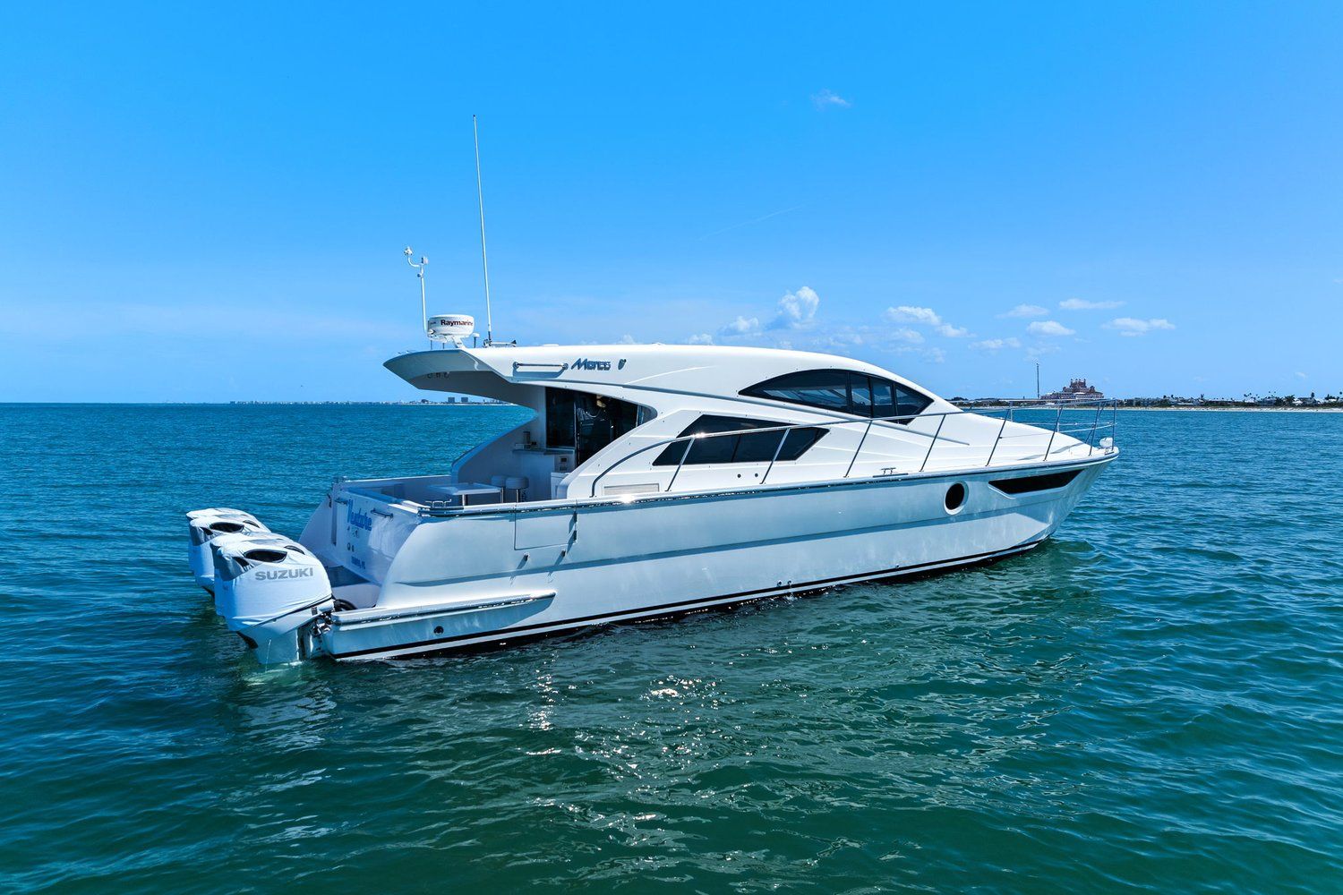 2018 Mym/Mares 47 Outboard Express Catamaran on calm water.
