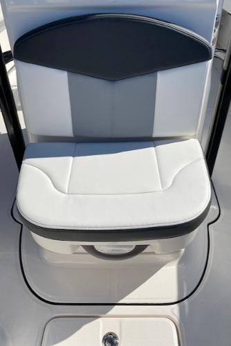 2024 Robalo R222 Center Console boat seat with white and gray upholstery.