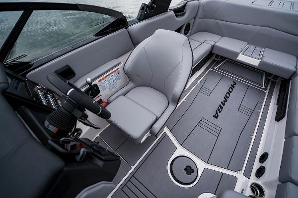 Manufacturer Provided Image: 2026 Moomba Max boat interior with sleek gray seating and modern dashboard design.
