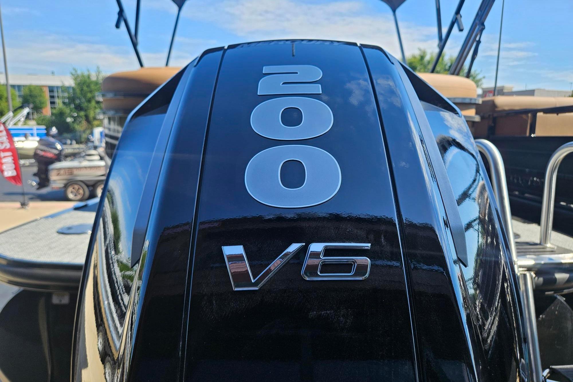 Close-up of 2026 Regency 230 DL boat's V6 engine with 200 horsepower.
