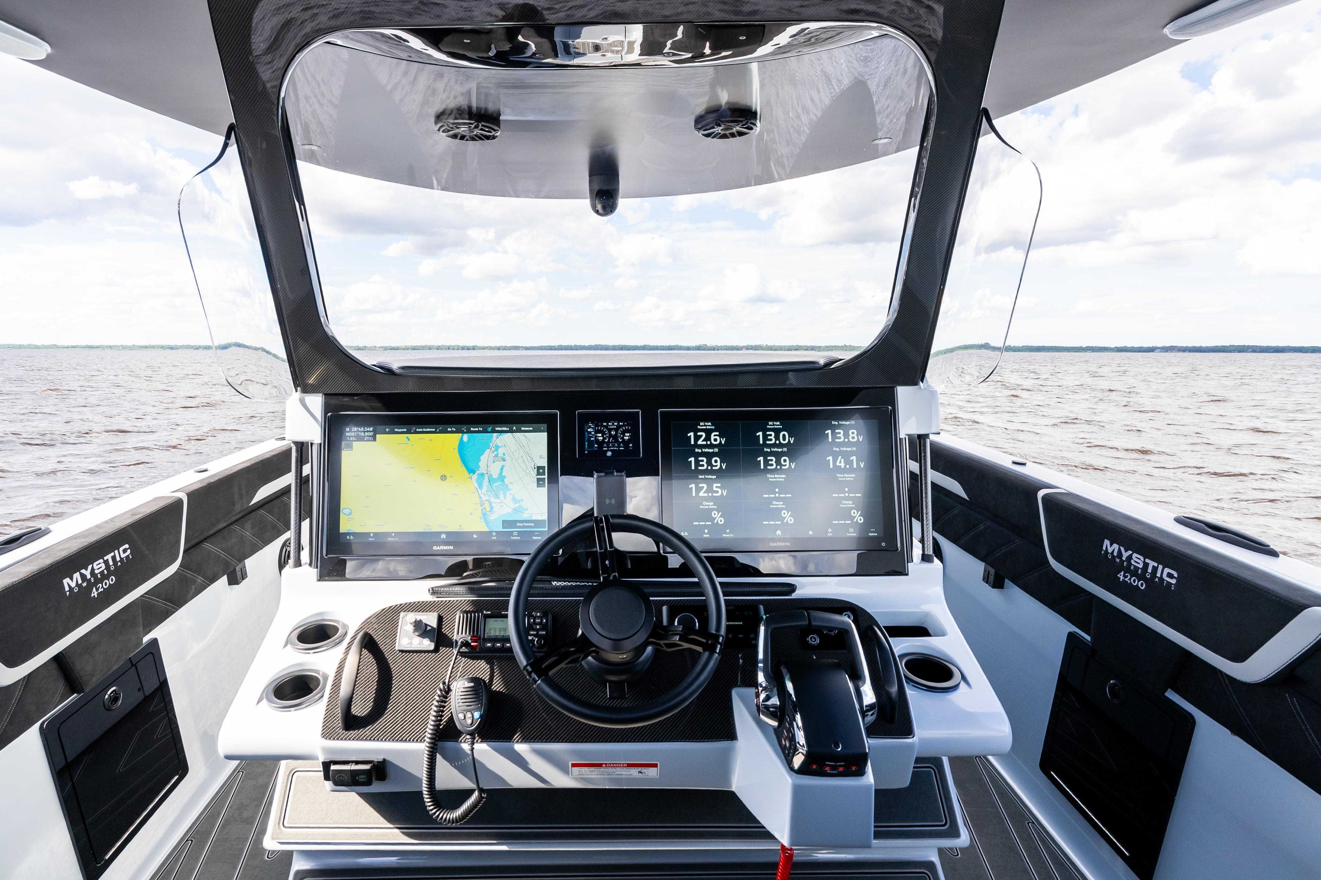 Cockpit of 2027 Mystic Powerboats M4200 with advanced navigation and control systems.
