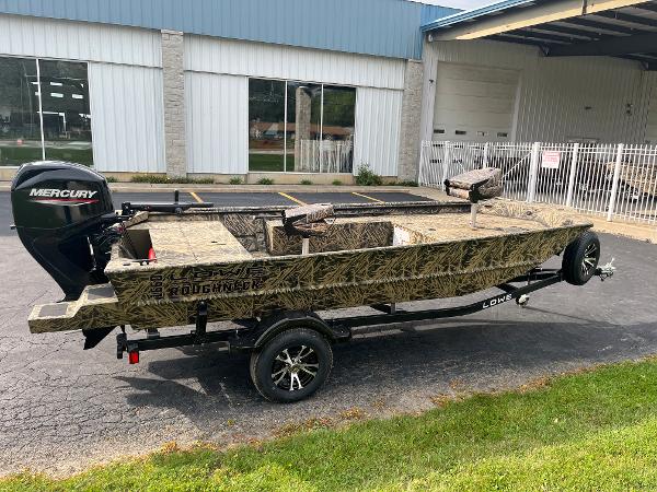 2024 Lowe Roughneck 1660 boat with Mercury outboard motor on trailer.