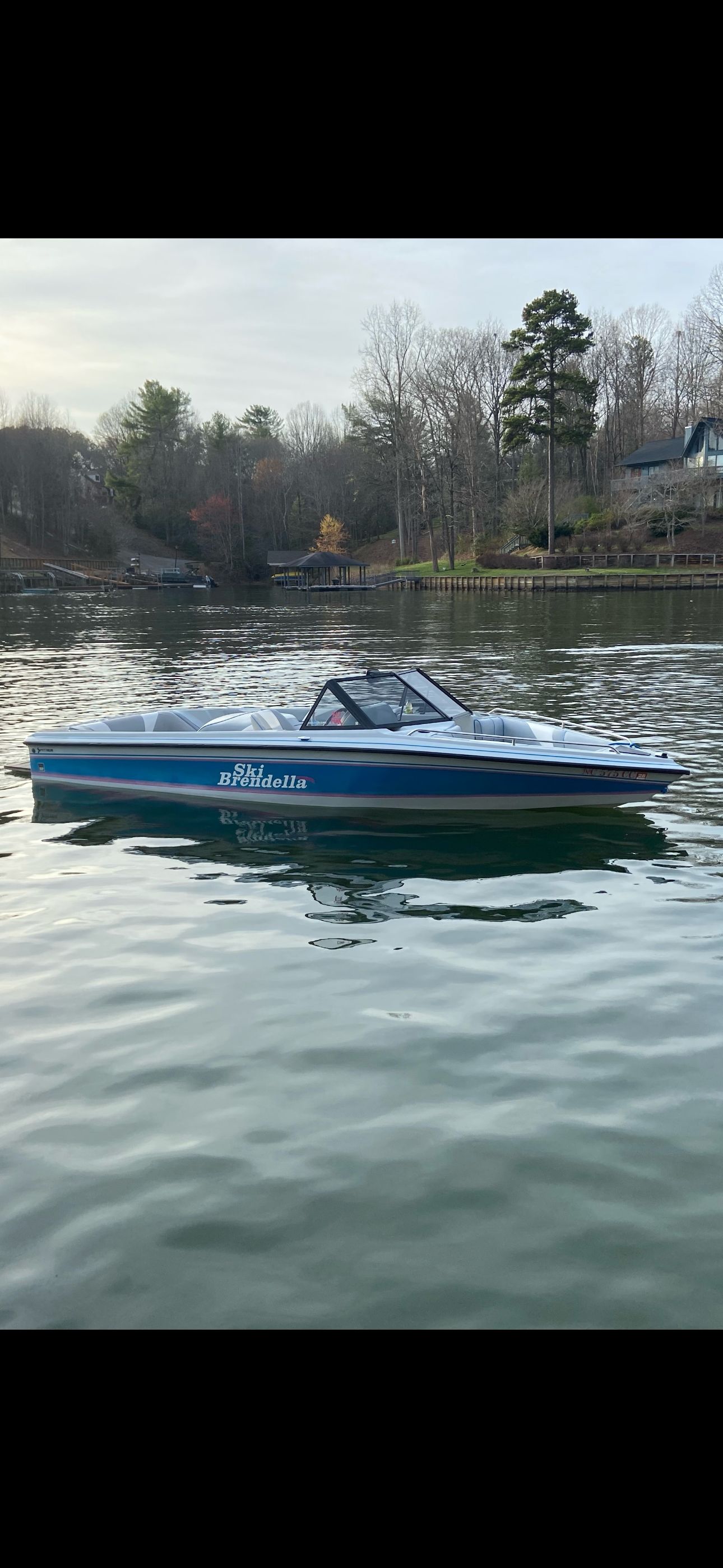 1992 Ski Brendella Spectrum on calm lake.
