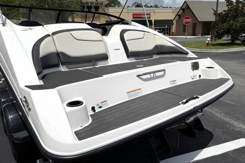 2017 Yamaha Boats SX210 rear view with seating and swim platform.